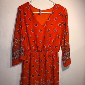 Orange long sleeved dress